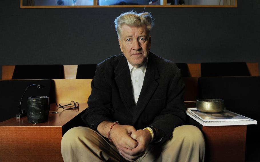 Filmmaker David Lynch poses for a portrait in his private screening room in Los Angeles on Sept. 9, 2010. 