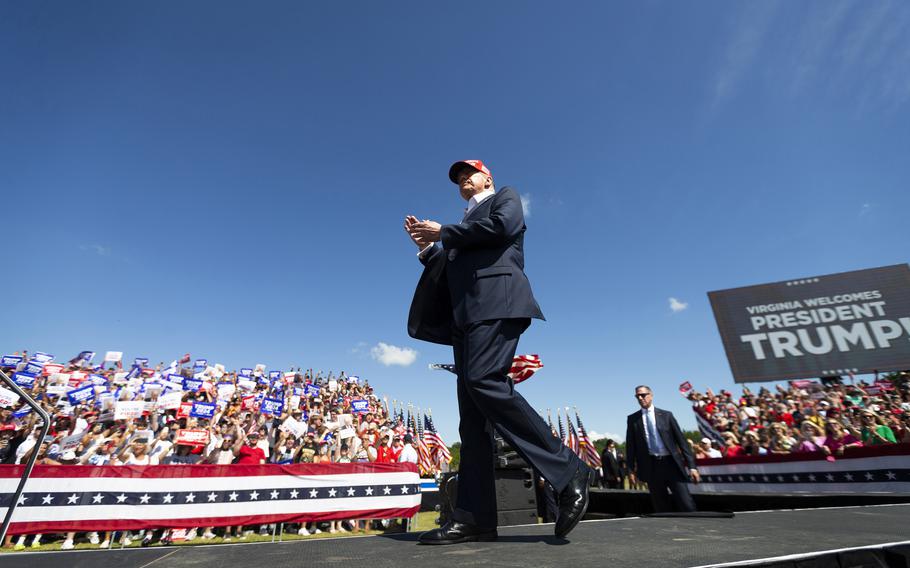 Former President Donald Trump is met with cheers as he enters the stage for his rally in Chesapeake, Virginia, on June 28, 2024. 