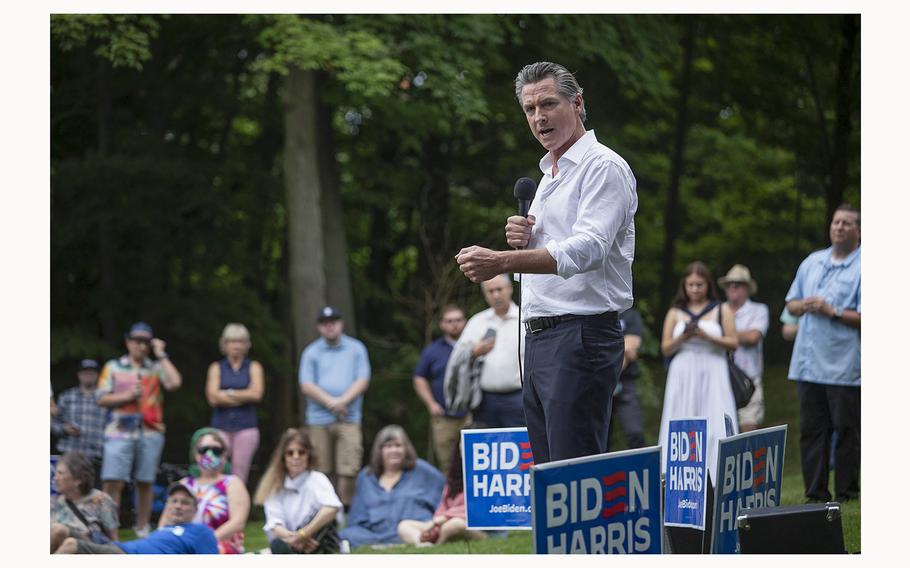 California Gov. Gavin Newsom campaigns for President Joe Biden at the Van Buren County Democratic Party’s “BBQ for Biden-Harris” event on July 4, 2024, in South Haven, Michigan. Newsom’s name has been mentioned as a possible replacement for  Biden should the president decide to not run for re-election.