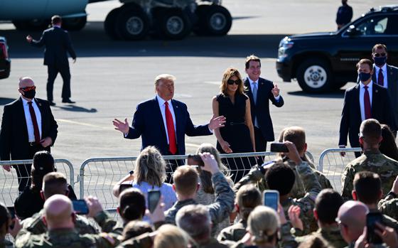 President Donald Trump and first lady Melania Trump greet a group of service members Oct. 22, 2020 at Berry Field Air National Base, Nashville, Tennessee. Trump was in town for the final presidential debate of the election cycle, held at Belmont University in downtown Nashville. (U.S. Air National Guard photo by Staff Sgt. Anthony Agosti)