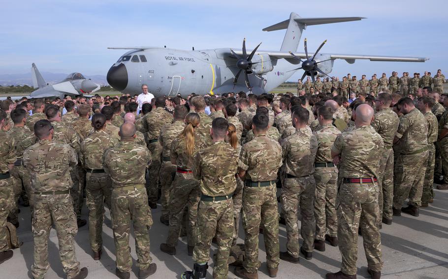 Britain’s Prime Minister Keir Starmer speaks to soldiers