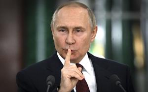 Russian President Vladimir Putin gestures while speaking at a news conference at the Kremlin in Moscowin December 2022.