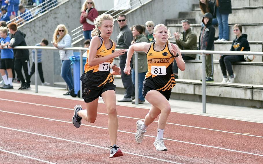 Stuttgart teammates Anna Konon, left, and Regan Stewart duel down the finishing straight for third and fourth place during a cross country meet on Sept. 14, 2024, at Ramstein High School on Ramstein Air Base, Germany.