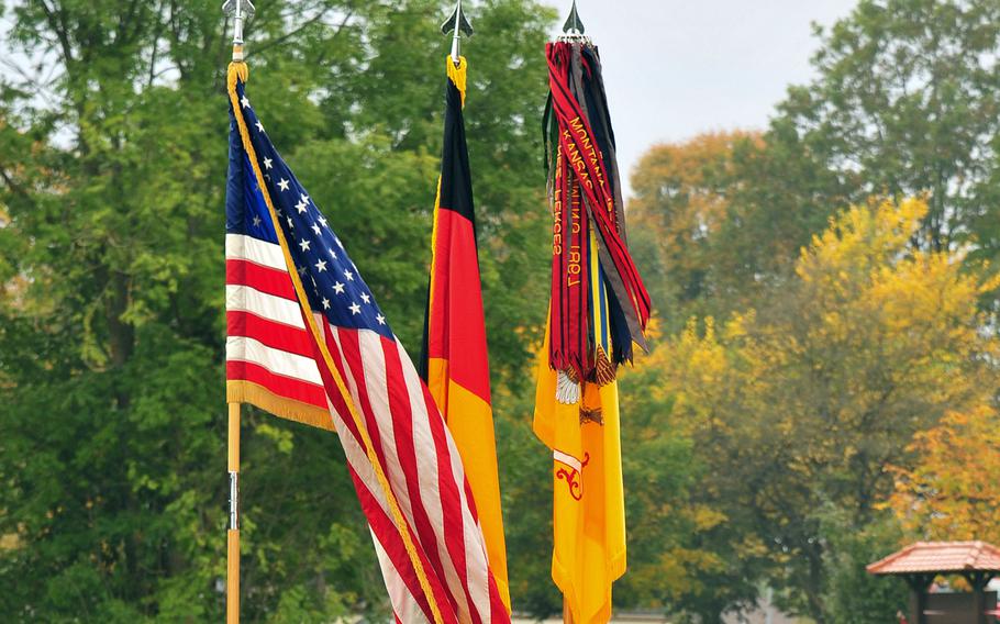 The American and German flags and the 2nd Cavalry Regiment colors are displayed during a change of responsibility ceremony at Rose Barracks in Vilseck, Germany. The Army is offering a $2,000 reward for information leading to the arrest and conviction of anyone responsible for stealing the American and German flags from inside the headquarters building, and raising the Confederate flag outside, earlier this week.