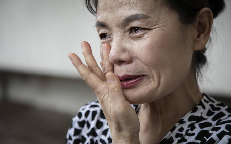 Im Su-ryuh sheds a tear as she talks about her life in North Korea, in Seoul on July 12. 