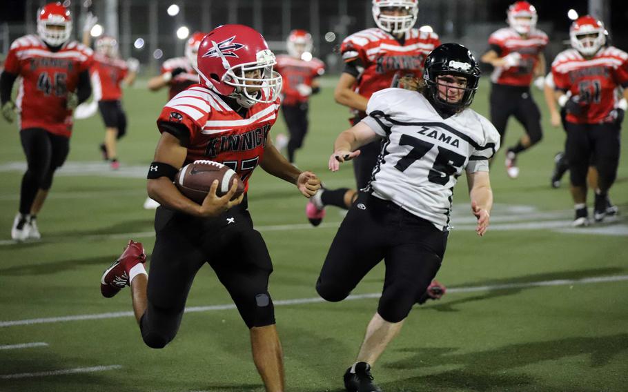 Nile C. Kinnick's Atsushi Blocton dashes upfield against Zama's Zach Waite.