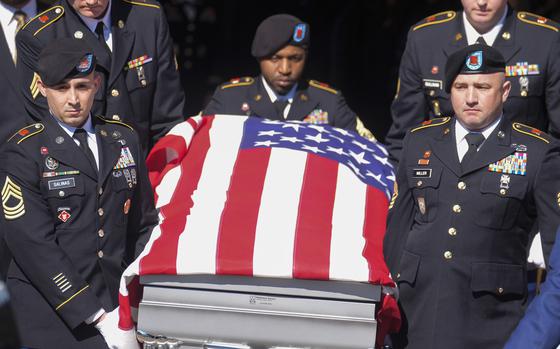 A casket holding the remains of Army Reserve soldier Staff Sgt. William ...