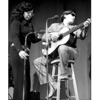 At Frankfurt, Germany, in March 1971, Jose Feliciano warms up backstage, is assisted in setting up by his wife, Hilda, then performs for the crowd.