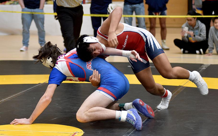 Andre Sunia looks for a takedown.