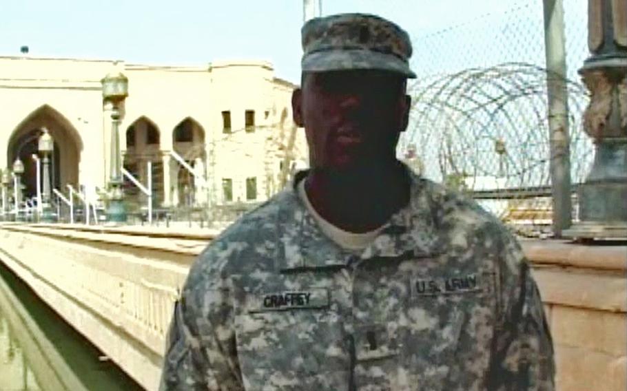 In this screenshot from a Defense Department video, then-1st Lt. Carz Craffey sends Thanksgiving greetings from Baghdad in 2009. Also known as Caz Craffy, the Army Reserve major and financial counselor was sentenced to 151 months in prison for defrauding Gold Star families out of millions of dollars in survivor benefits.