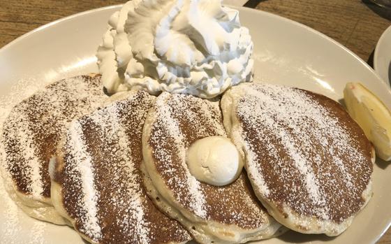 Classic pancakes with whipped cream at Kona’s Coffee, a Hawaiian pancake cafe found throughout Japan.