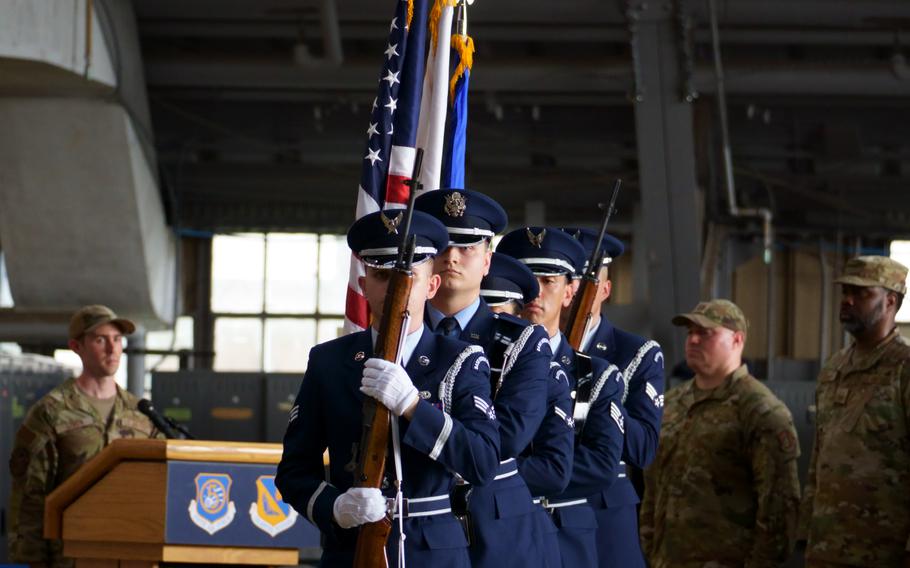 An Air Force color guard arrives at the 374th Air Wing change-of-command ceremony at Yokota Air Base, Japan, on June 9, 2034.