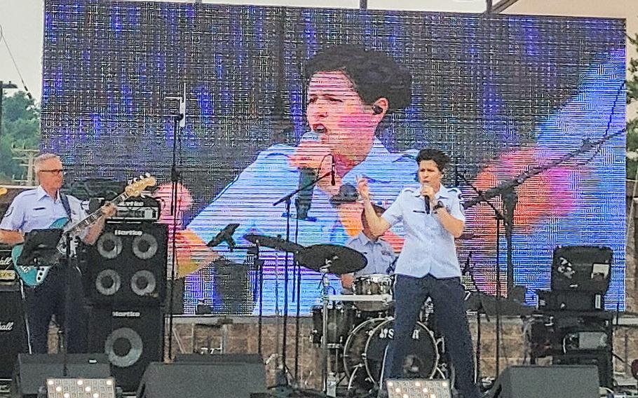Master Sgt. Joanne Griffin leads Pacific Trends, an Air Force musical ensemble, during the July 4, 2024, Liberty Fest at Osan Air Base, South Korea. 