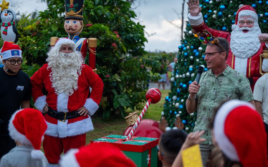 U.S. Air Force Brig. Gen. Thomas Palenske, commander of the 36th Wing, speaks at the Tree Lighting Ceremony 