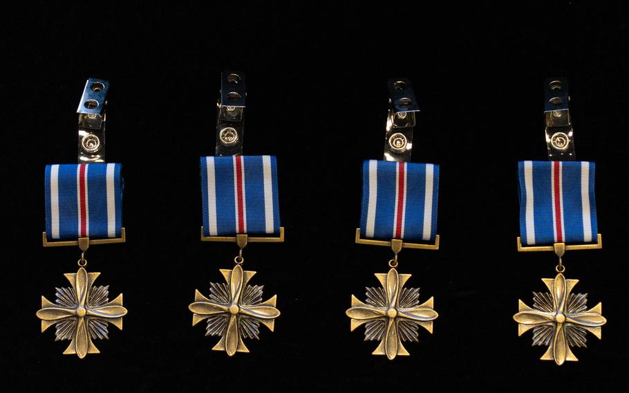 Four Distinguished Flying Cross medals