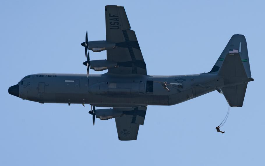 Soldiers leap from C-130 at celebration