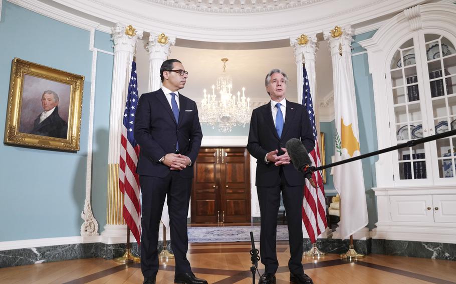 Secretary of State Antony Blinken, right, meets with Cyprus' Foreign Minister Constantinos Kombos, Monday, June 17, 2024, at the State Department in Washington. 