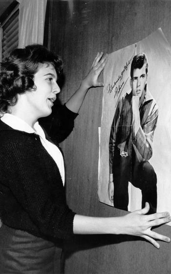 Cherry LeClear, a 14-year-old from Rapid City, S.D., looks longingly at her idol singer Fabian. LeClear lived with 10 other girls and 16 boys in Pomeroy Hall while attending nearby American High School on the Seoul Area South Command Post, as there were no high schools for them to attend where their families lived. 