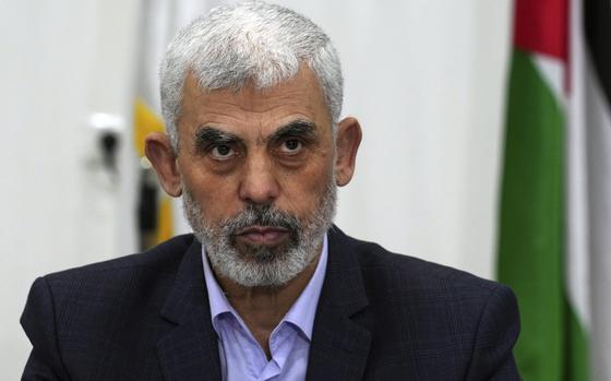 FILE - Yahya Sinwar chairs a meeting with leaders of Palestinian factions at his office in Gaza City, April 13, 2022. (AP Photo/Adel Hana, File)