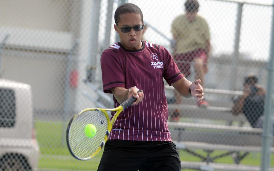 Sean Simpkins hits the ball.