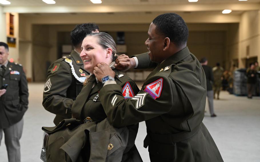 Soldiers inspect dress uniforms