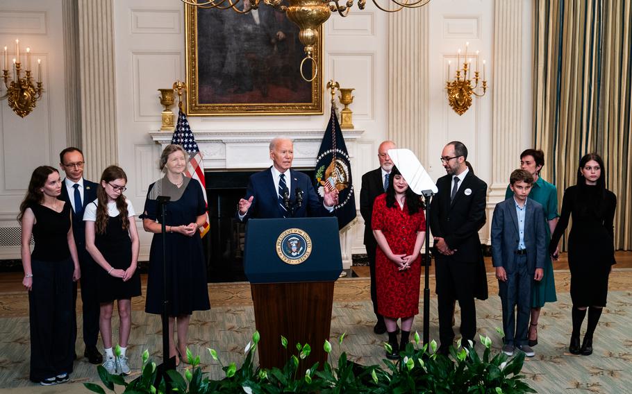 Joe Biden delivers remarks on the prisoner swap with Russia from the White House on Aug. 1, 2024, with several family members of those freed in attendance.