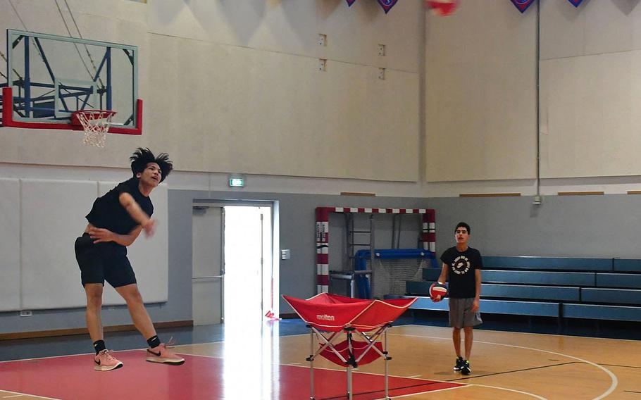 Aviano sophomore Micah Guerrero works on his jump serve during a practice session at the Aviano Middle High School gymnasium Monday, Aug. 5, 2024.