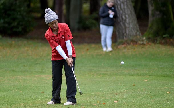 Kaiserslautern's Asia Andrews hits the ball on the No. 12 fairway during the final round of the DODEA European golf championships on Oct. 10, 2024, at Woodlawn Golf Course on Ramstein Air Base, Germany.