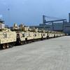 Army M2A3 Bradley Fighting Vehicles sit in a row.