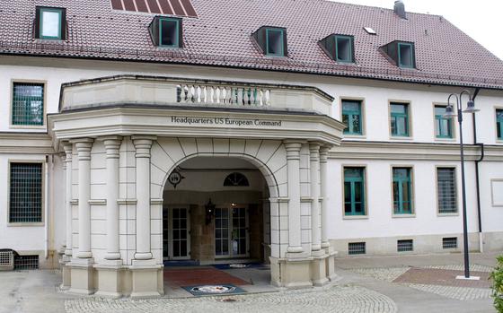 A white building with the words “Headquarters US European Command” on the front is shown.