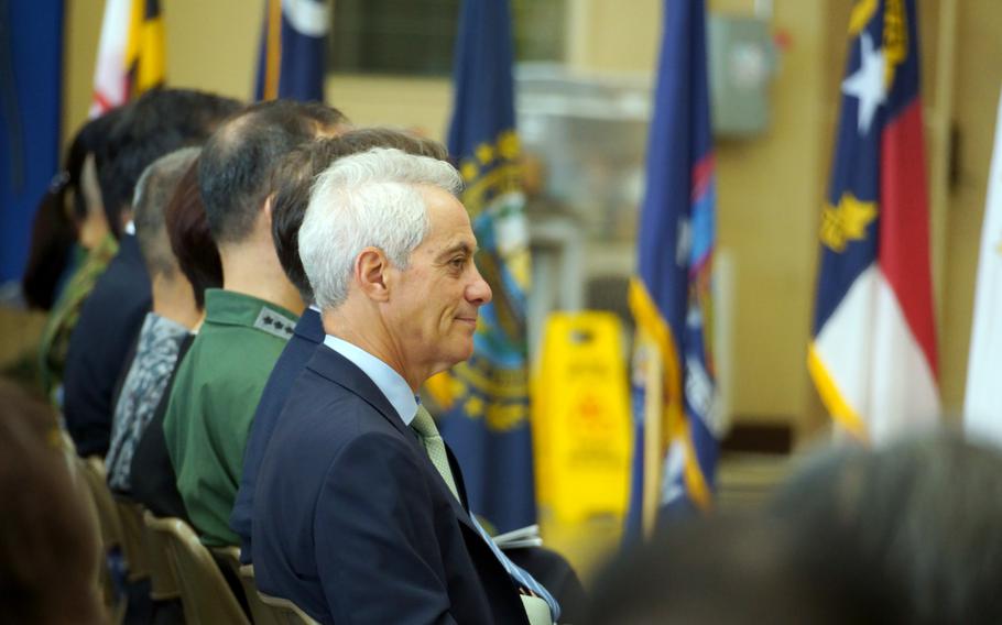 The U.S. ambassador to Japan watches a change-of-command ceremony.