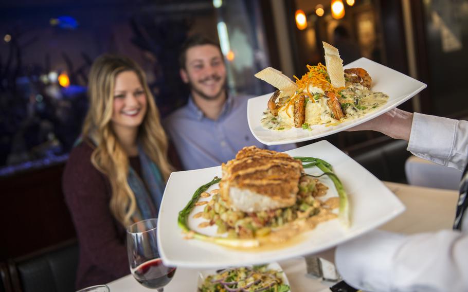 Guests enjoy dinner at The Fish House in Pensacola, Fla.