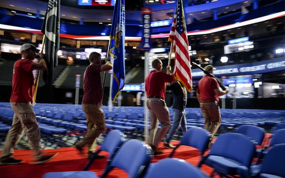 A color guard comprised of veterans rehearses ahead of the 2024 Republican National Convention, Sunday, July 14, 2024, in Milwaukee. (AP Photo/Matt Rourke)