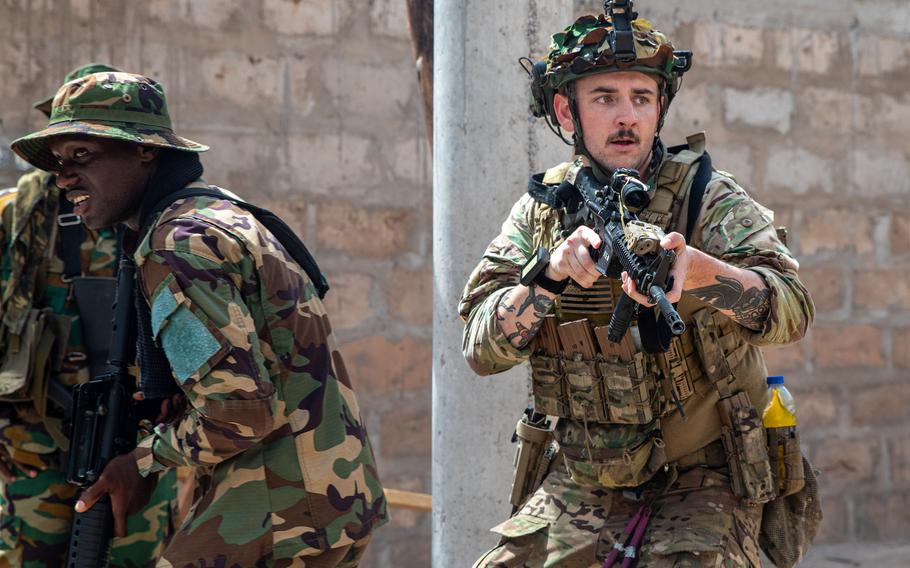 Sgt. Myles Shoemaker of the Maryland Army National Guard trains Ghanaian soldiers in room clearing tactics in Damongo, Ghana, May 16, 2024. Ghana is among the countries the U.S. is looking at working with more closely in light of recent coups and mounting terror threats in West Africa.