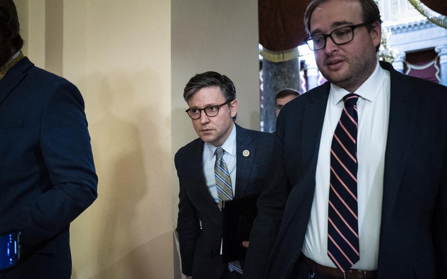 House Speaker Mike Johnson (R-La.) walks to the floor for a vote on Thursday, Oct. 26, 2023. 