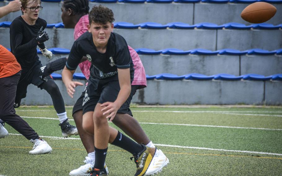 Crew Flatau, a ninth grade student of Osan Middle High School, performs a drill during football practice at Osan Air Base, South Korea, Monday, Aug. 5, 2024.