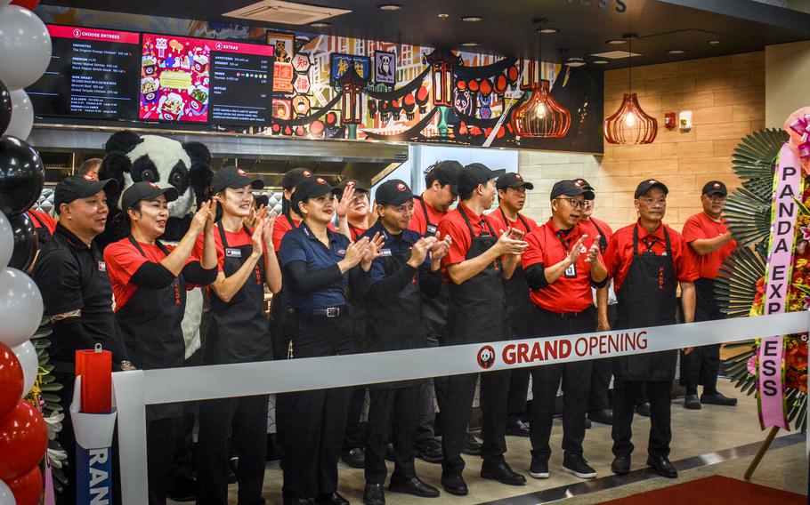 Panda Express employees cheer on grand opening day at Camp Humphreys.