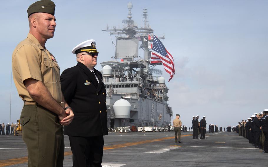 Col. Sean Dynanand Capt. Tate Robinson watch over sailors