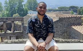 Petty Officer 1st Class Jelani Hill is shown May 14, 2022, during a visit to the Pompeii archaeological site near Naples, Italy. Hill, who had served in the Navy since December 2018, died Oct. 1, 2024, aboard the aircraft carrier USS Harry S. Truman as it was transiting the Atlantic Ocean.  

