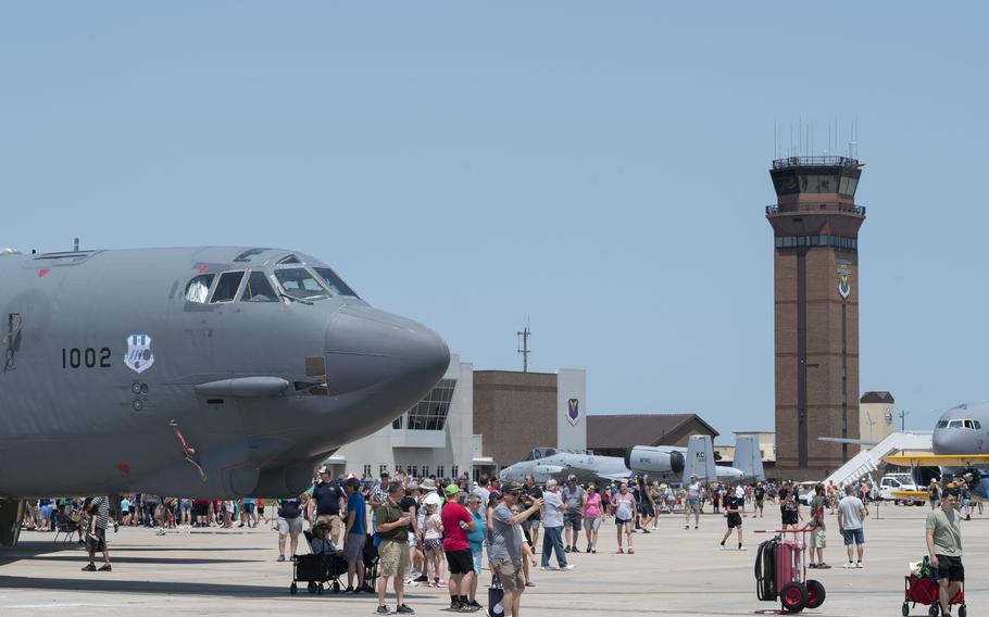 A crowd walks around the flightline looking at a B-52 Stratofortress aircraft, an A-10C Thunderbolt II aircraft and a KC-135 Stratotanker aircraft during the 2024 Wings Over Whiteman Air Show at Whiteman Air Force Base, Mo., July 13, 2024. 