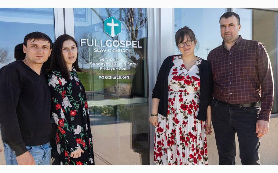Volodymyr Molebnyi and his wife Iryna, at left, and Serhii Marchenko and his wife Yulia – refugees from the same town in Ukraine – attend the Full Gospel Slavic Church, in Meridian, Idaho, together. 