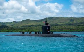 240629-N-QR679-1002 NAVAL BASE GUAM (June 29, 2024) – The Los Angeles-class fast-attack submarine USS Springfield (SSN 761) transits Apra Harbor, Naval Base Guam, June 29, 2024. Springfield returns to its homeport after completing a 4-month western pacific deployment. Assigned to Commander, Submarine Squadron 15 at Polaris Point, Naval Base Guam, Springfield is one of four Los Angeles-class fast-attack submarines forward-deployed in the Pacific. Renowned for their unparalleled speed, endurance, stealth, and mobility, the Los Angeles-class submarine serves as the backbone of the Navy's submarine force, ensuring readiness and agility in safeguarding maritime interests around the world. (U.S. Navy photo by Lt. James Caliva)