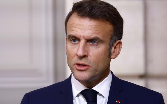 French President Emmanuel Macron delivers a statement as part of Nigerian President Bola Tinubu's two-day state visit to France, Thursday, Nov. 28, 2024 at the Elysee Palace in Paris. (Sarah Meyssonnier/Pool via AP)