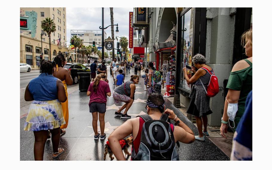 Despite the Delta coronavirus variant, tourists flock to Hollywood Boulevard to check out the Walk of Fame and other iconic sites on August 11, 2021 in Los Angeles, California.