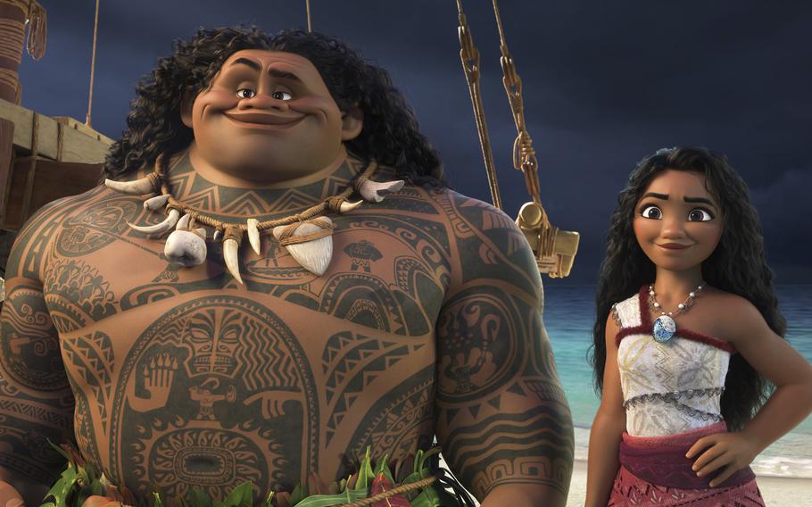 The characters Maui and Moana stand next to their boat in a scene from “Moana 2.”