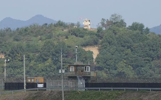 A guard post sits on top of a hill in North Korea.