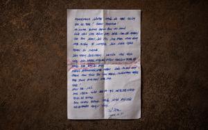 A handwritten letter with a message from North Korean leader Kim Jong Un, found on a North Korean soldier in Russia’s Kursk region and photographed on Tuesday in the Sumy region of Ukraine. MUST CREDIT: Ed Ram for The Washington Post