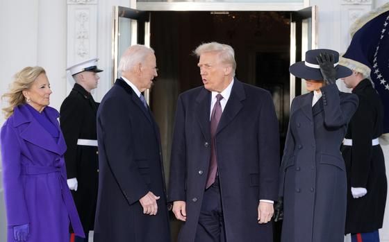 President-elect Donald Trump and Melania Trump are greeted by President Joe Biden and first lady Jill Biden, upon their arrival at the White House, Monday, Jan. 20, 2025, in Washington. (AP Photo/Alex Brandon)