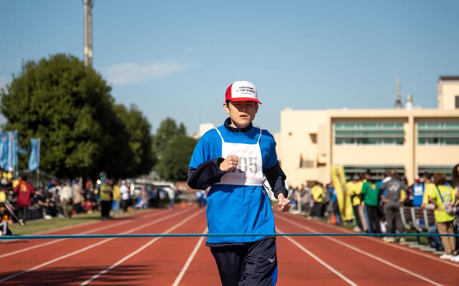 An athlete running on a track.