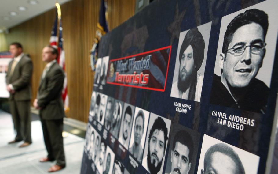 A photo of Daniel Andreas San Diego, top right, appears on a poster of the FBI’s most wanted terrorists